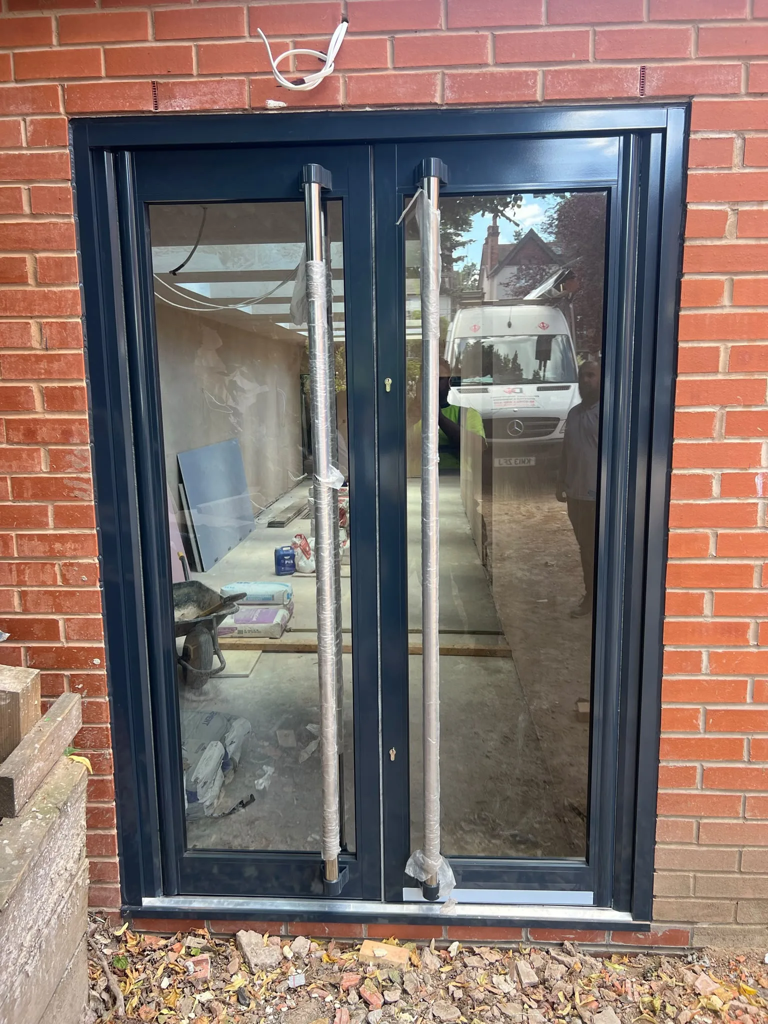 Bi-Folding Doors — Grewal Shopfront & Shutters